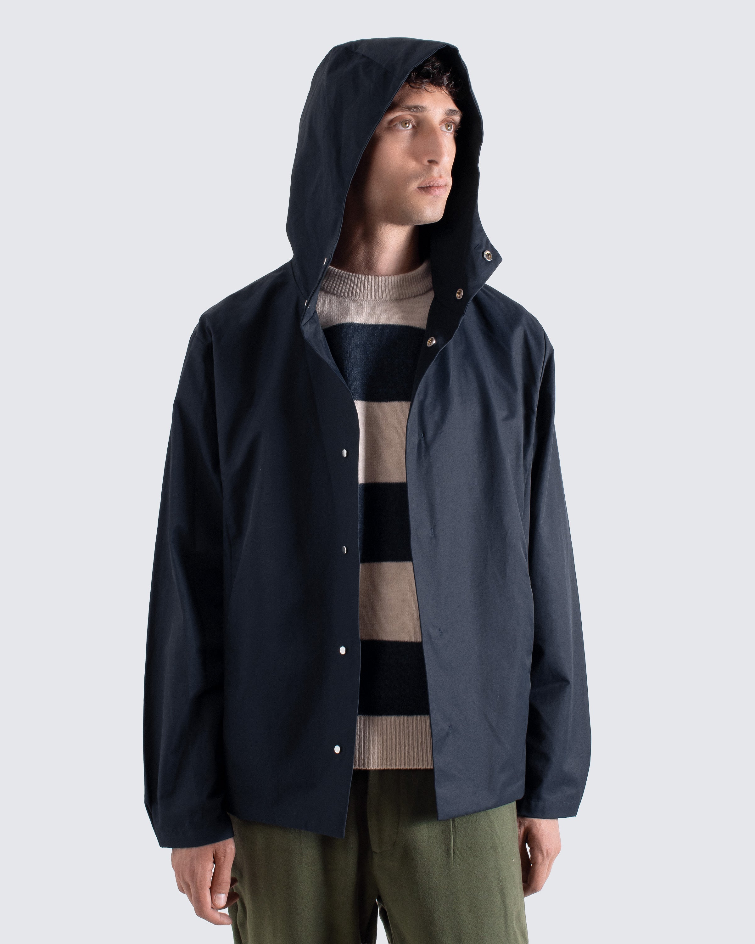 Men’s navy hooded rain jacket with popper front – Far Afield