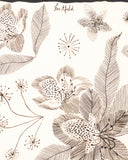 Close-up of the artwork and finish on the Gurans Neckerchief in light tan