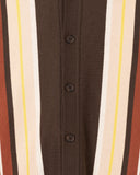 Close-up of the engineered jacquard stripes and tonal corozo buttons in brown