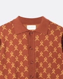 Lok Kala Knit Shirt, close-up of the collar, tonal corozo buttons and folk-art jacquard