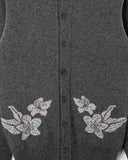 Close-up of the knit structure on the Gurans Albers Cardigan in dark grey