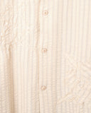 Close-up of the fabric and detailing on the Gurans Veloso Shirt in tan