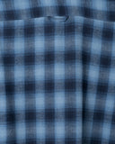 Close-up of the fabric and detailing on the Mustang Check Larry Shirt in blue