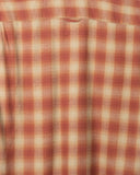 Close-up of the fabric and detailing on the Mustang Check Larry Shirt in brown
