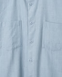 Close-up of the fabric on the Lok Kala Two-Pocket Shirt in light blue